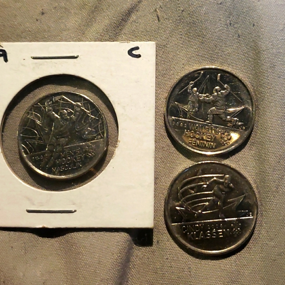 3 limited edition Canadian quarters Mens hockey, womans hockey and Cindy Klassen